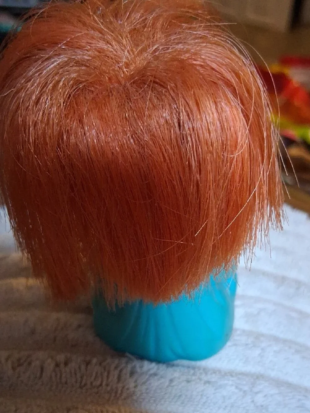 Cheerful Kids Doll Figurine in Teal Outfit with Red Hair